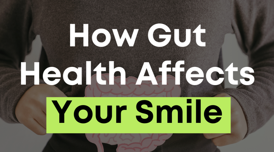 Woman holding a stomach illustration representing how gut health affects oral health and overall smile